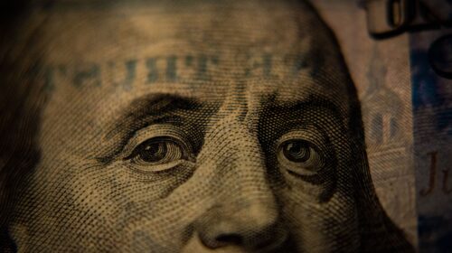 A closeup of a US hundred dollar bill (Benjamin Franklin side).